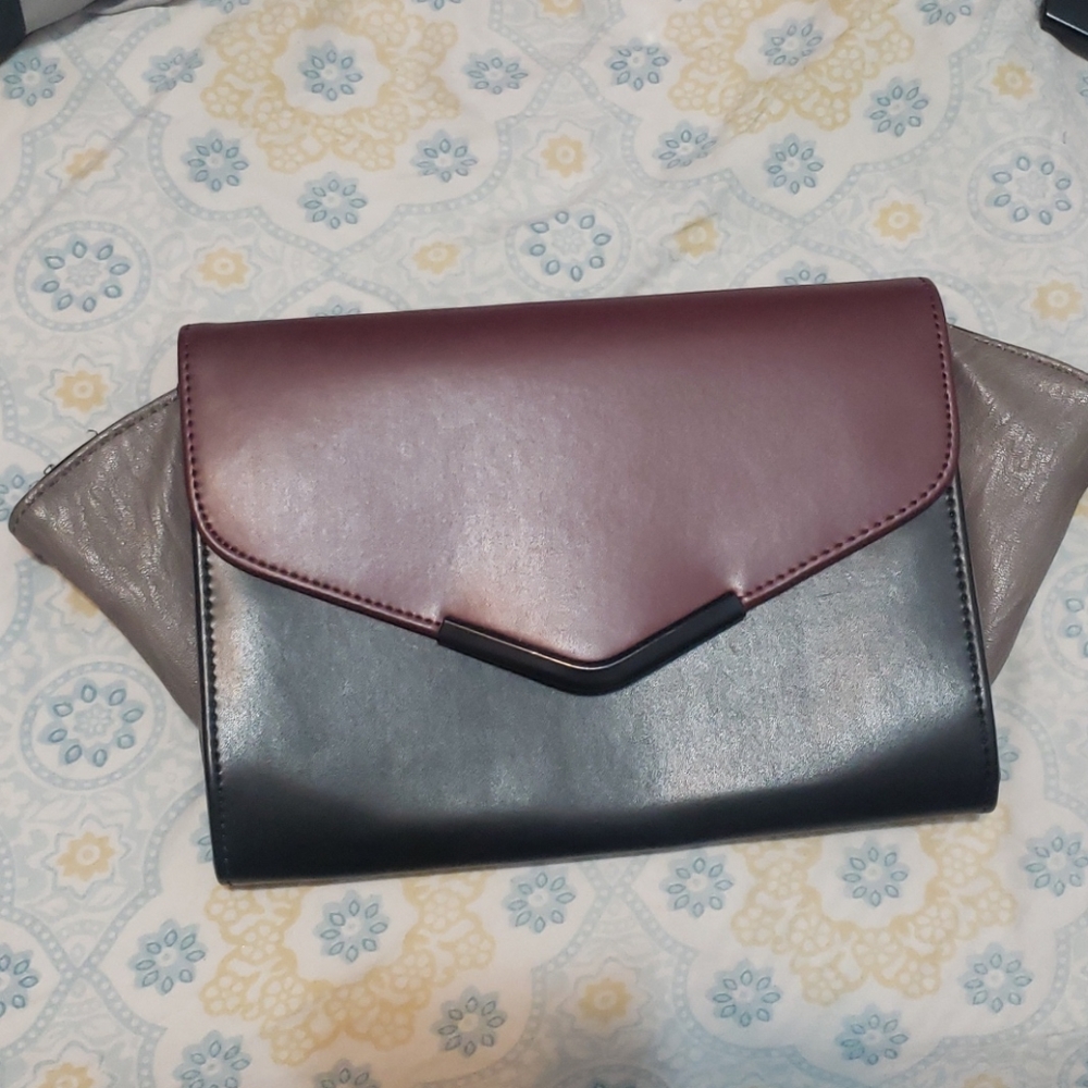 Burgundy, black, and grey purse
